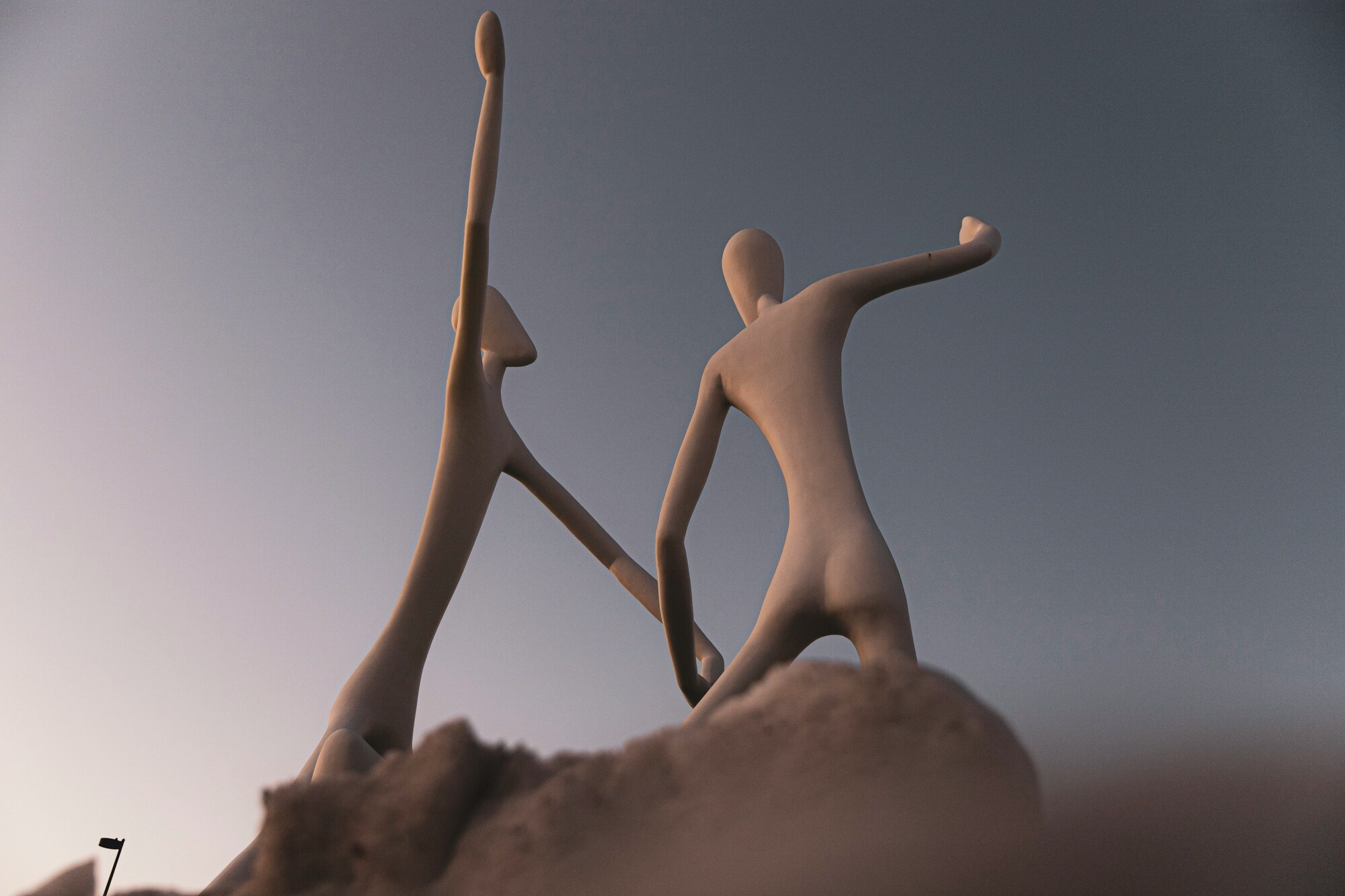 figurines dancing with each other